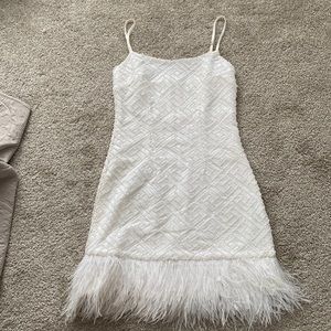 Elliatt petrea dress. White mini sparkle feather dress